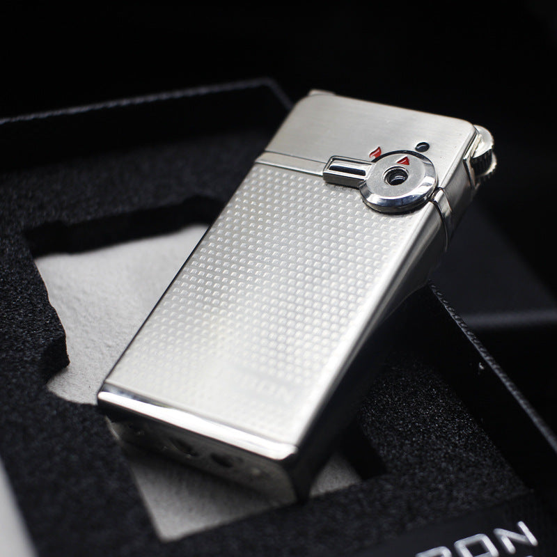 Dual flame refillable metal lighter held in hand, windproof petrol lighter close-up