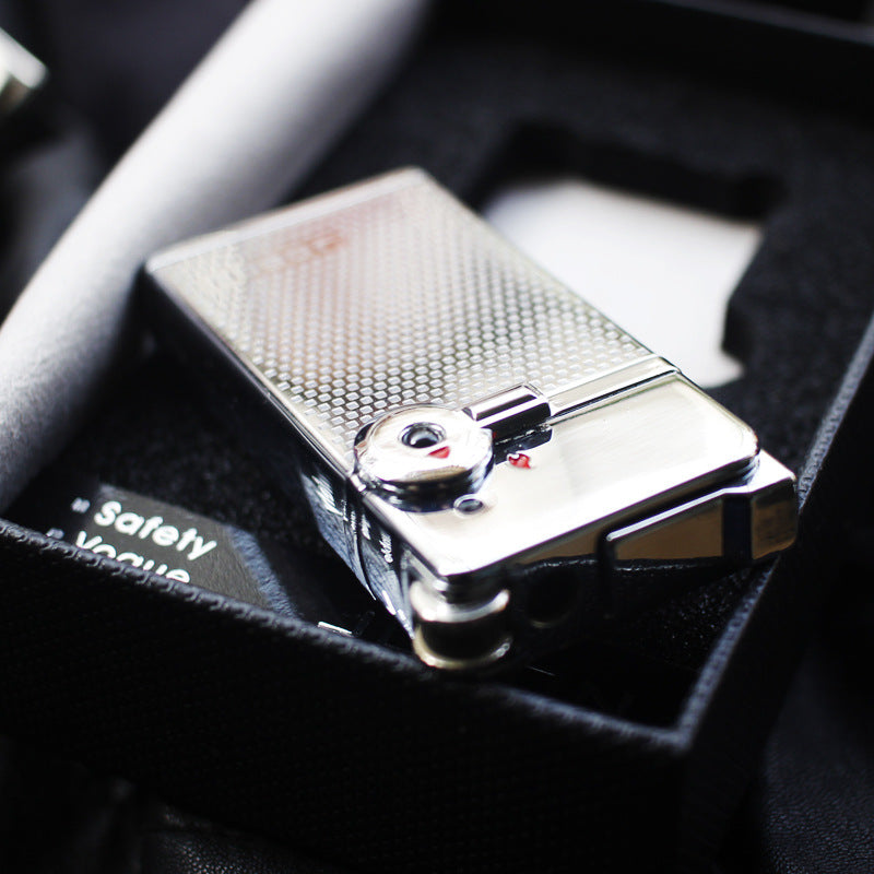 Dual flame refillable metal lighter held in hand, windproof petrol lighter close-up