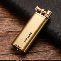 Vintage brass oil lighter ignited with flame and sparks, refillable petrol lighter close-up