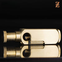 Vintage brass oil lighter internal wick detail, refillable petrol lighter close-up
