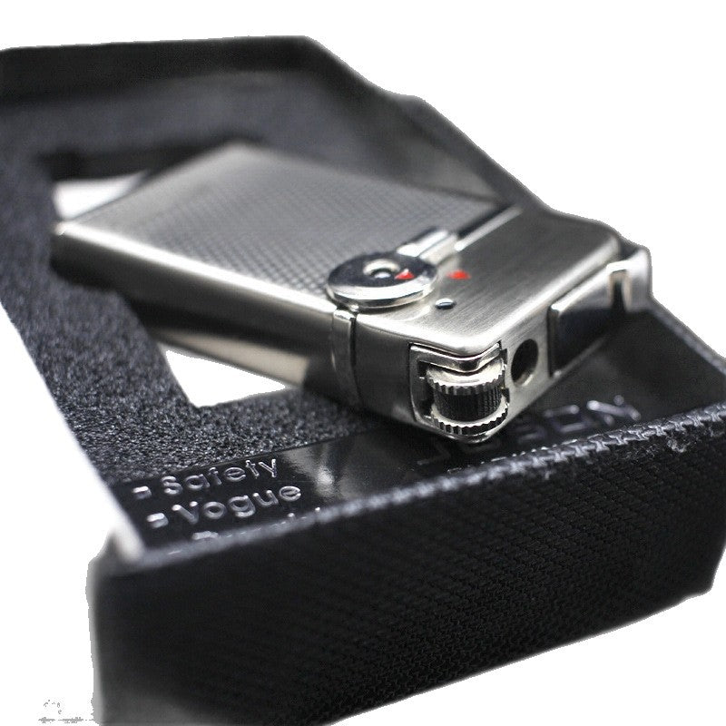Dual flame refillable metal lighter held in hand, windproof petrol lighter close-up