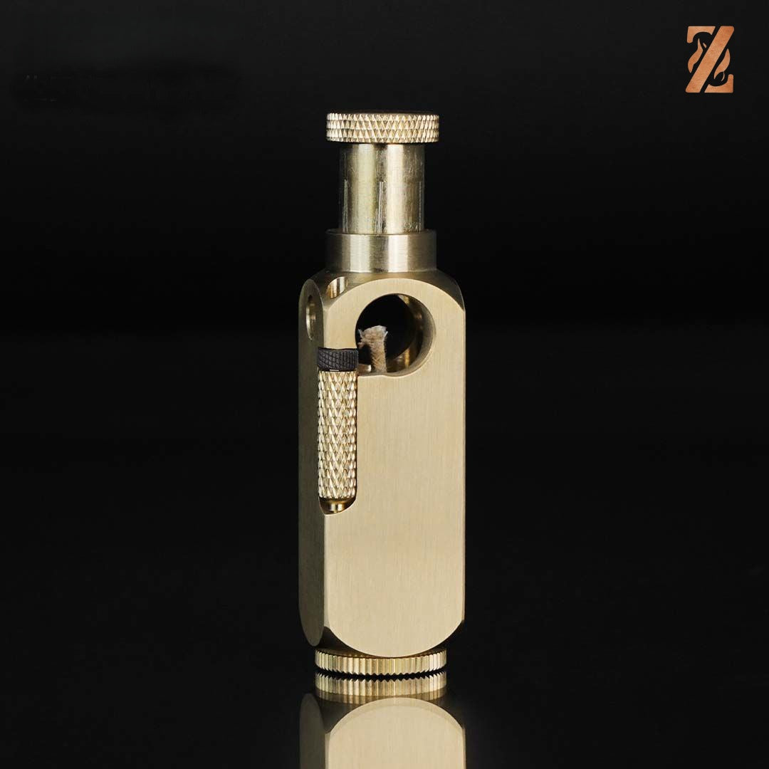 Vintage brass oil lighter internal wick detail, refillable petrol lighter close-up
